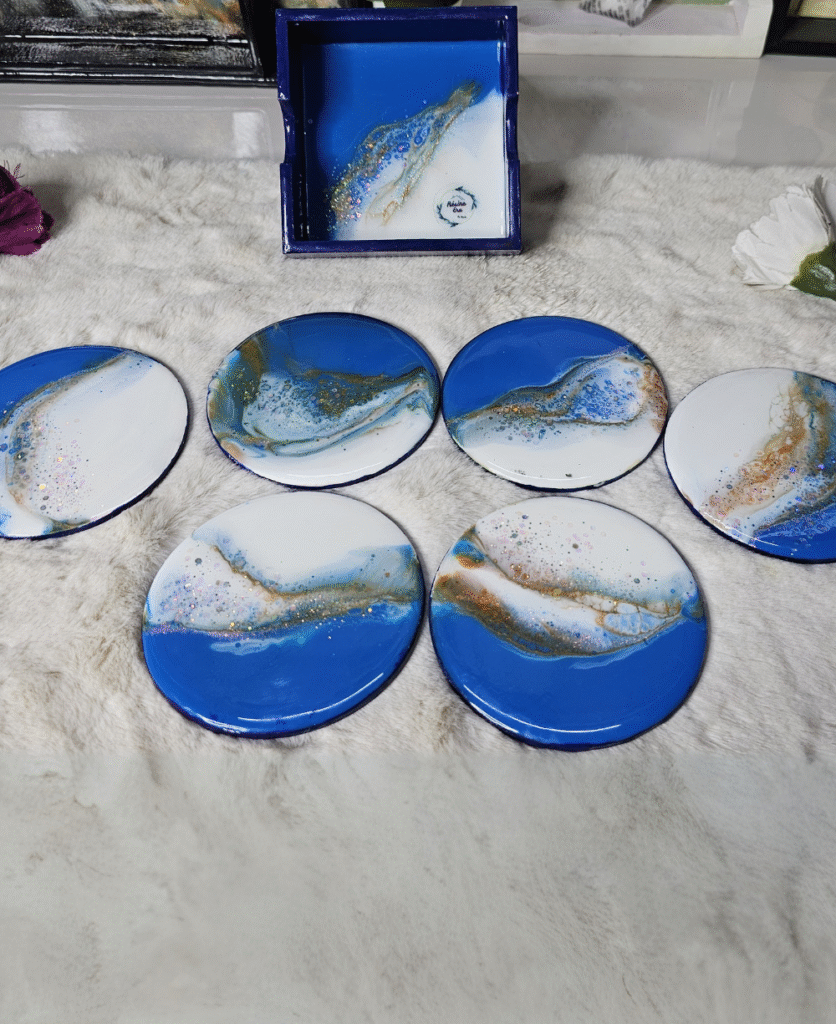 Handcrafted ocean-inspired resin coaster set with shimmering details