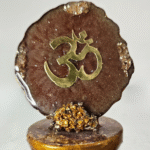Brown resin om dashboard idol with shimmer and stones