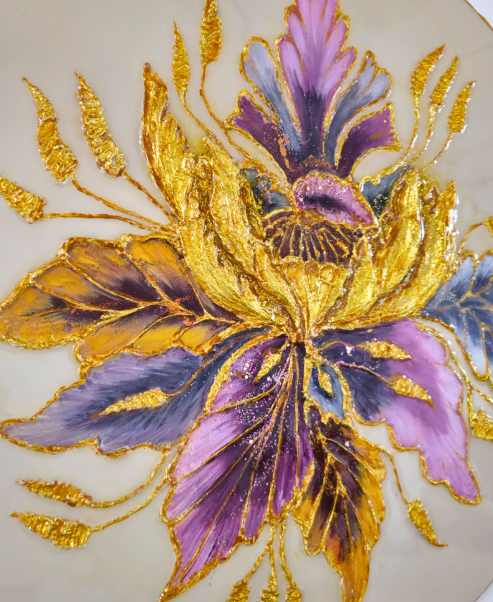 Handmade flower-inspired resin artwork with gold accents