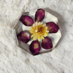 Hexagon resin paperweight with purple petals and yellow flower