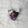 Transparent resin heart paperweight with cloudy swirl effect