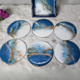 Burgundy and white wooden resin coasters with marble design and holder