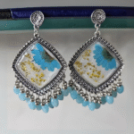 Blue resin earrings with pressed flowers and turquoise bead fringe