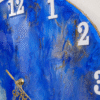 Artistic resin clock in blue and gold marble effect