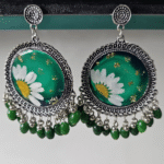 Green resin earrings with pressed flowers and green bead accents