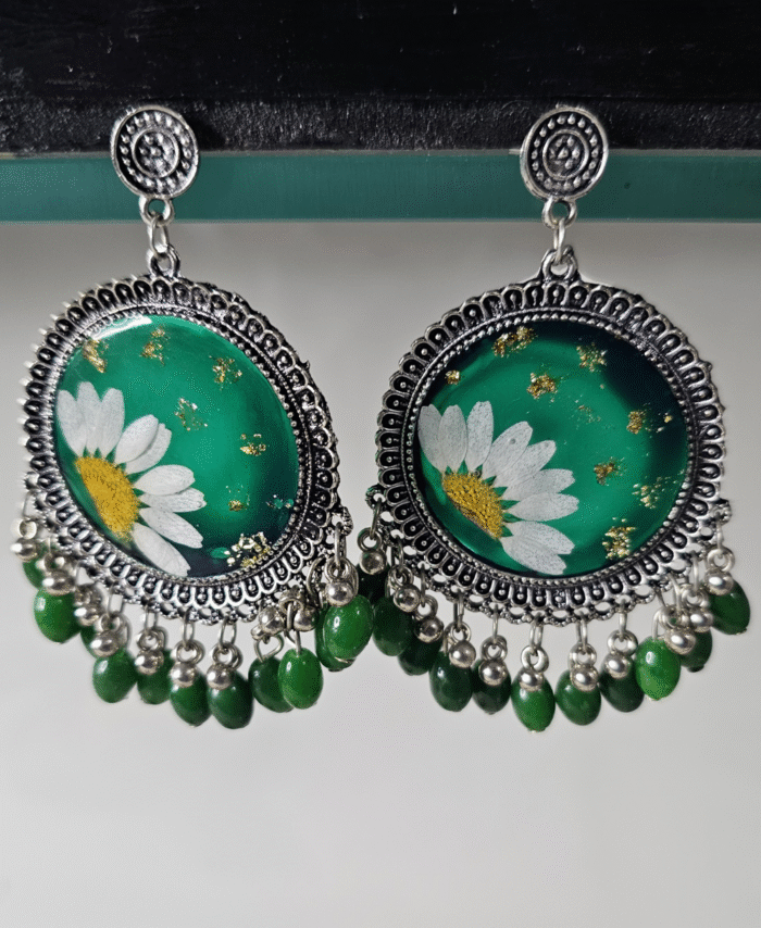 Green resin earrings with pressed flowers and green bead accents