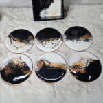 Blue and white resin coasters with ocean wave design and holder