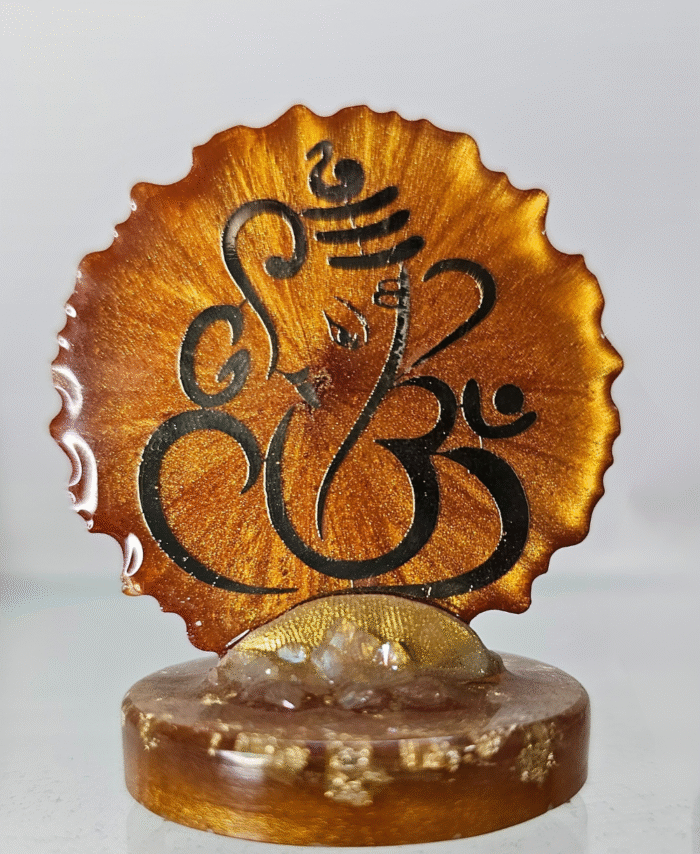 Orange resin Ganesha dashboard idol with shimmer and stones