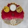 Handmade dark red pooja thali with floral and leaf design