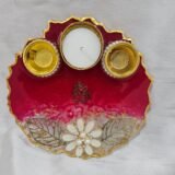 Handmade dark red pooja thali with floral and leaf design