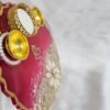 Decorative resin thali with diya holders and leaf motifs