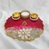 Resin pooja plate in dark red with pearl flower decoration