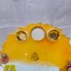 Handmade Diya Thali with floral design and diya holders.