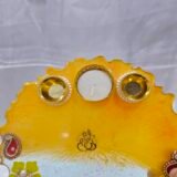 Handmade Diya Thali with floral design and diya holders.