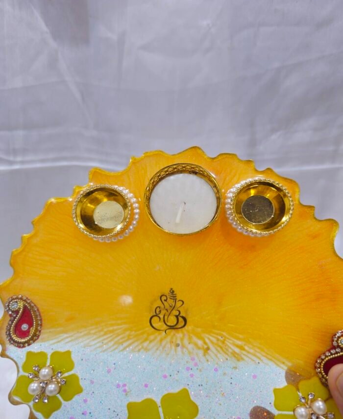 Handmade Diya Thali with floral design and diya holders.