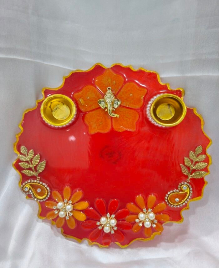 Pink Resin Diya Thali with peacock design and dual diya holders.