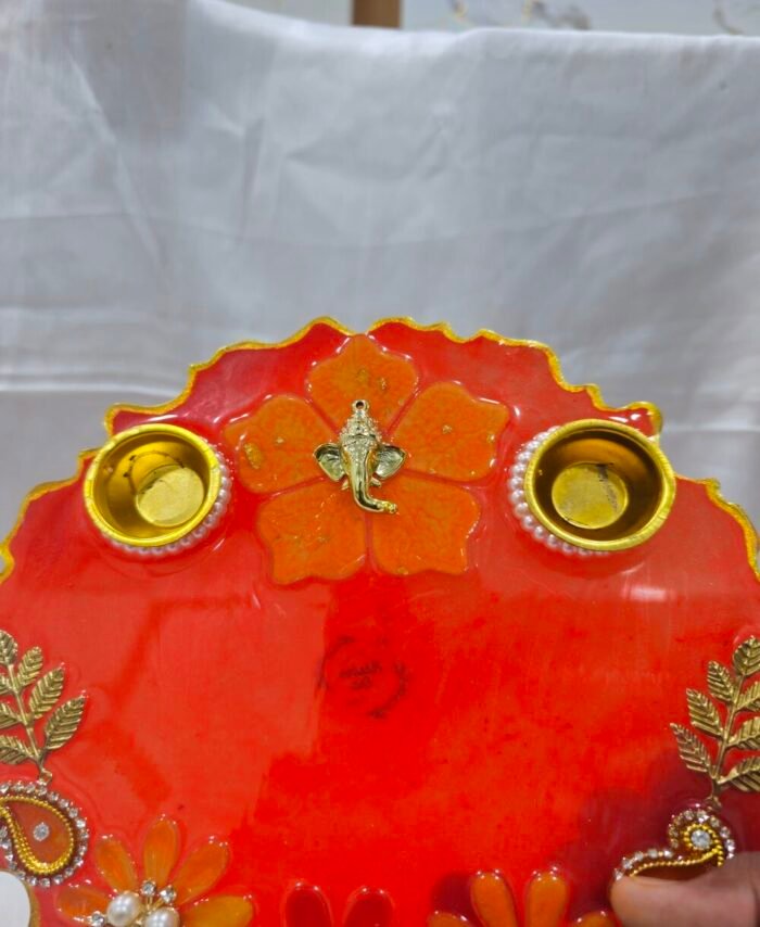 Handmade Diya Plate with floral and peacock design.