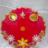 Yellow Resin Diya Thali with golden accents and dual diya holders.