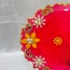 Handmade yellow diya plate for Diwali rituals.