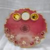 Bright Red Resin Pooja Thali with Golden Ganesha Idol.