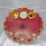 Bright Red Resin Pooja Thali with Golden Ganesha Idol.