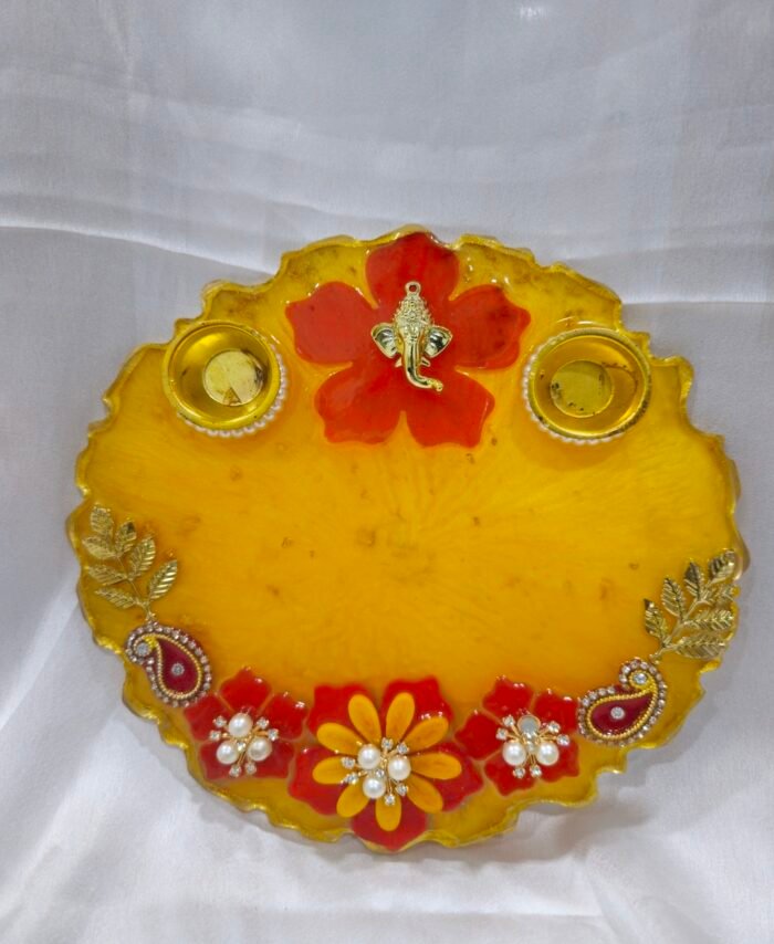Blue Resin Diya Thali with floral design and pearl accents.