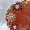 Elegant maroon wedding pooja plate with floral detailing