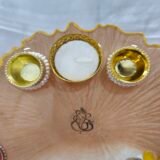 Designer thali with pearl diya holders and golden detailing