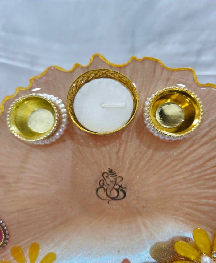 Designer thali with pearl diya holders and golden detailing