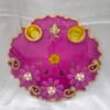 Pink decorative pooja thali with Ganesh idol and pearl work
