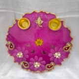Pink decorative pooja thali with Ganesh idol and pearl work