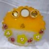 Yellow Diya Thali with Floral and Pearl Decorations.