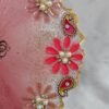 Pink resin pooja plate with pearl and paisley design