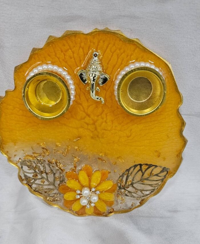 Yellow Resin Pooja Thali with Ganesha Idol and Floral Decoration