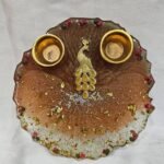 Brown Resin Pooja Thali with Golden Peacock Centerpiece
