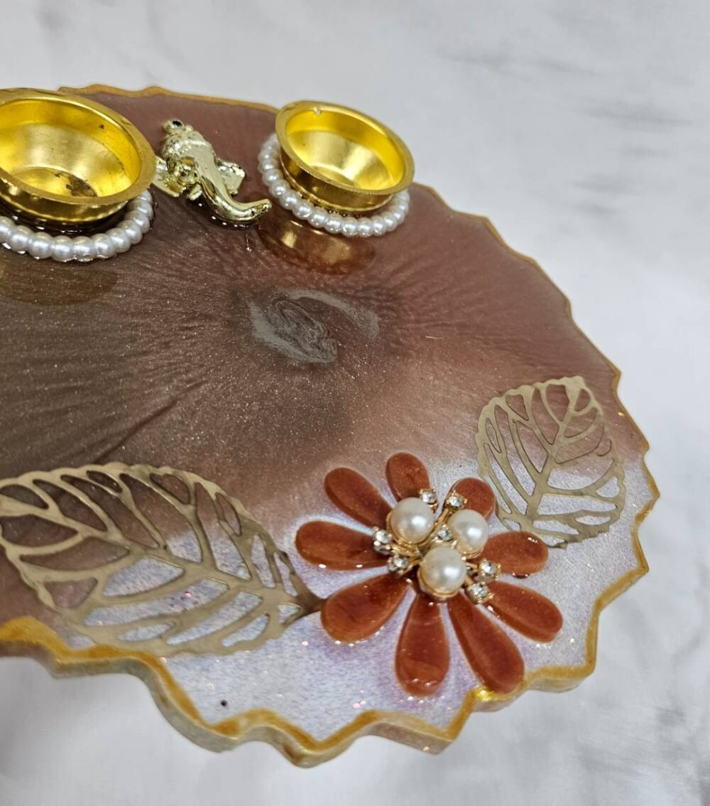 Elegant brown Ganesha pooja thali for Diwali