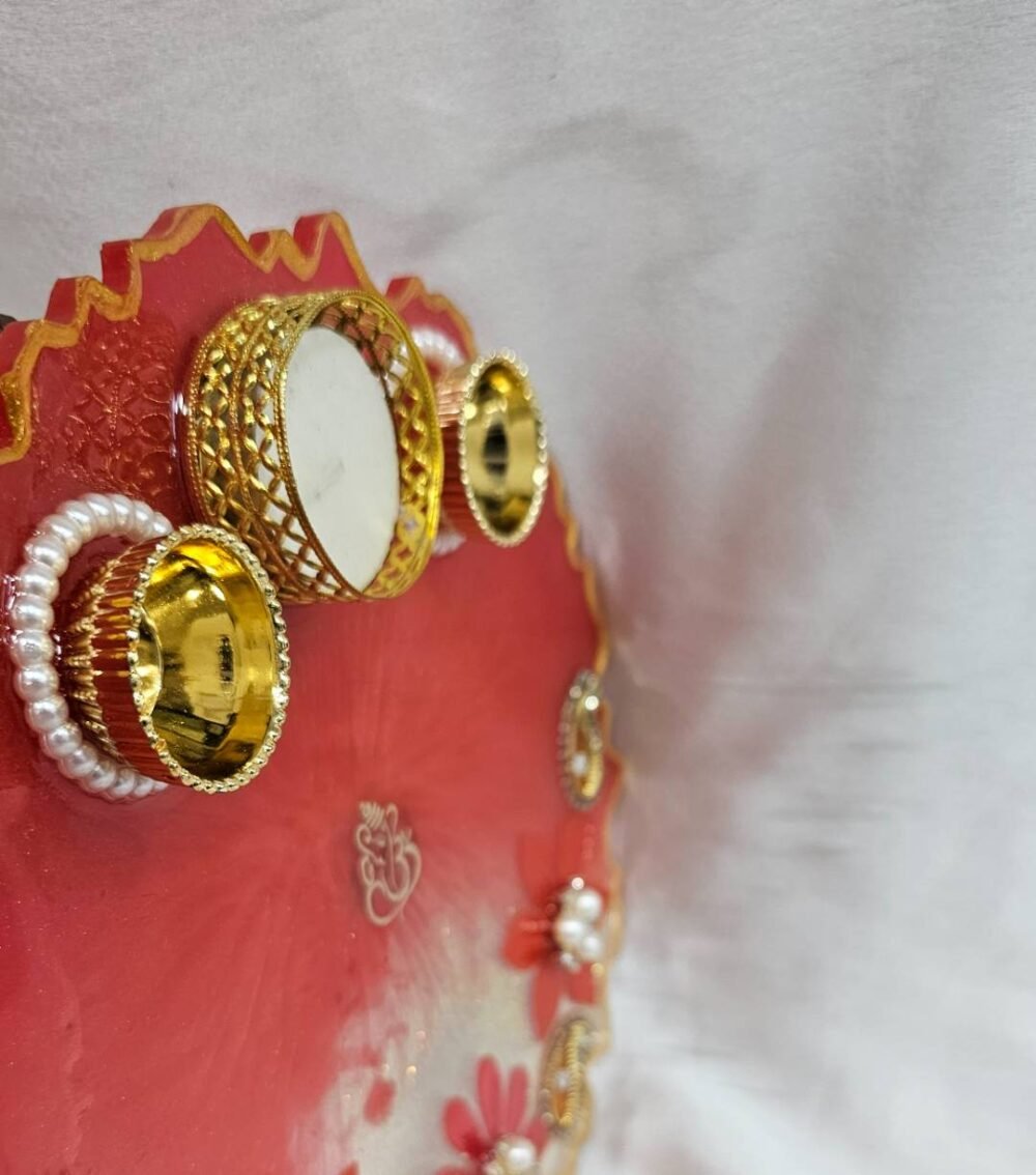 Decorative red thali for Diwali pooja and Raksha Bandhan