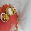 Decorative red thali for Diwali pooja and Raksha Bandhan