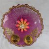 Purple resin pooja thali with floral centerpiece