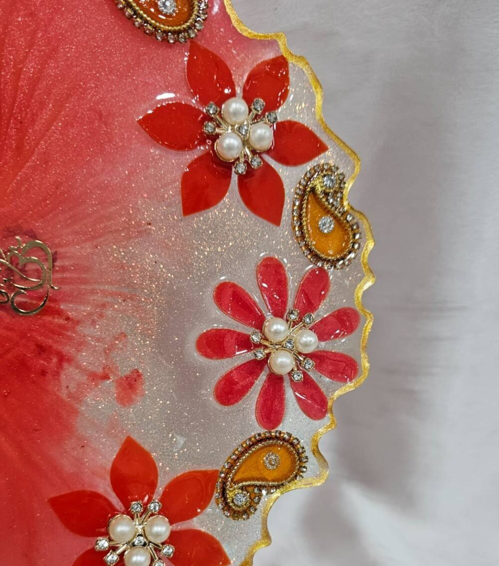 Elegant handmade red pooja plate with golden accents