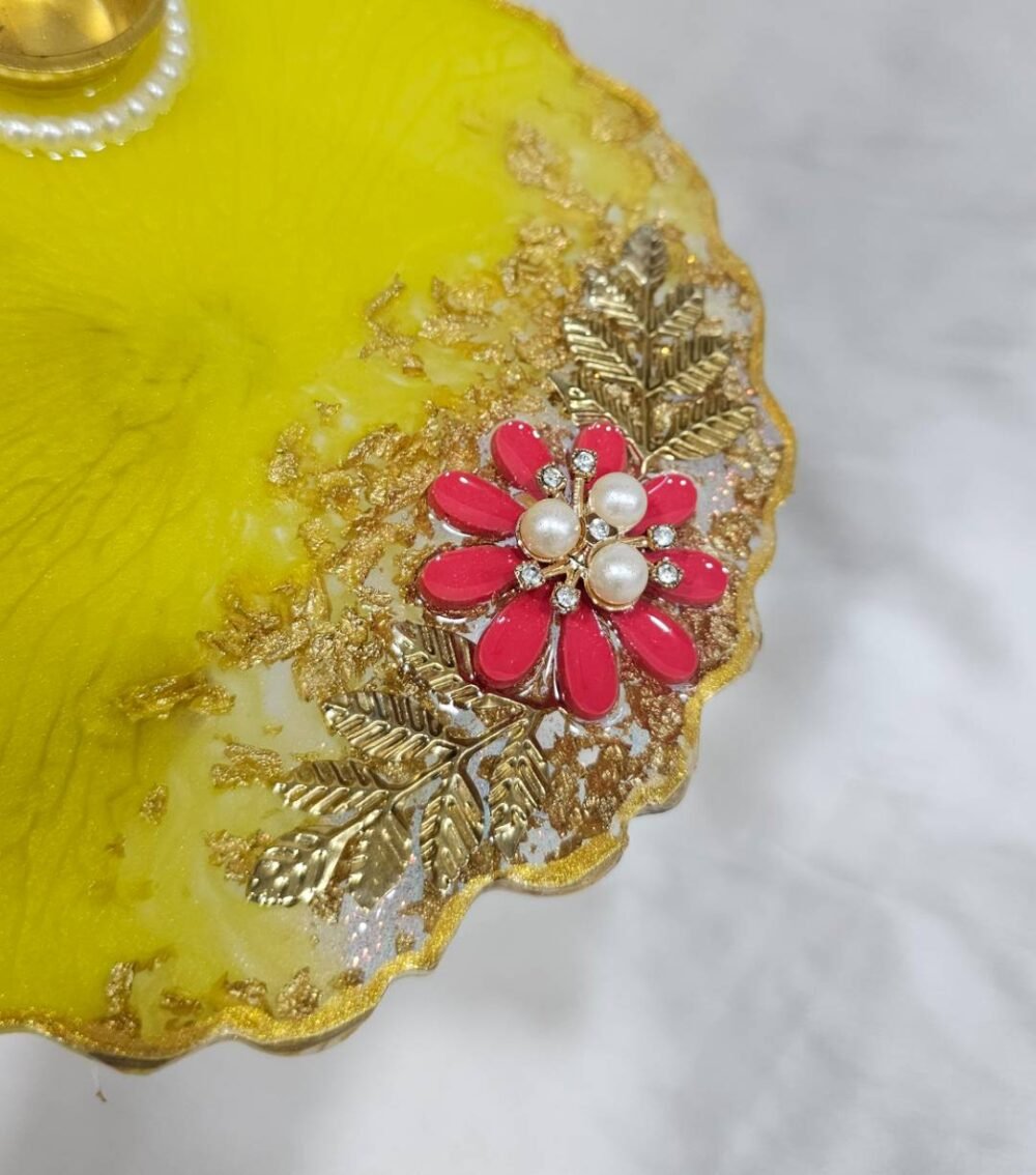 Handmade yellow pooja plate with floral design