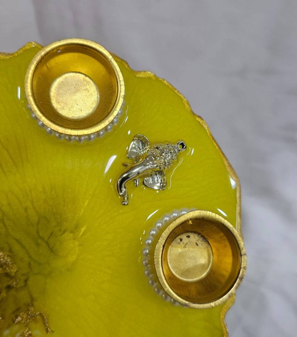 Yellow resin Ganesha thali for festivals