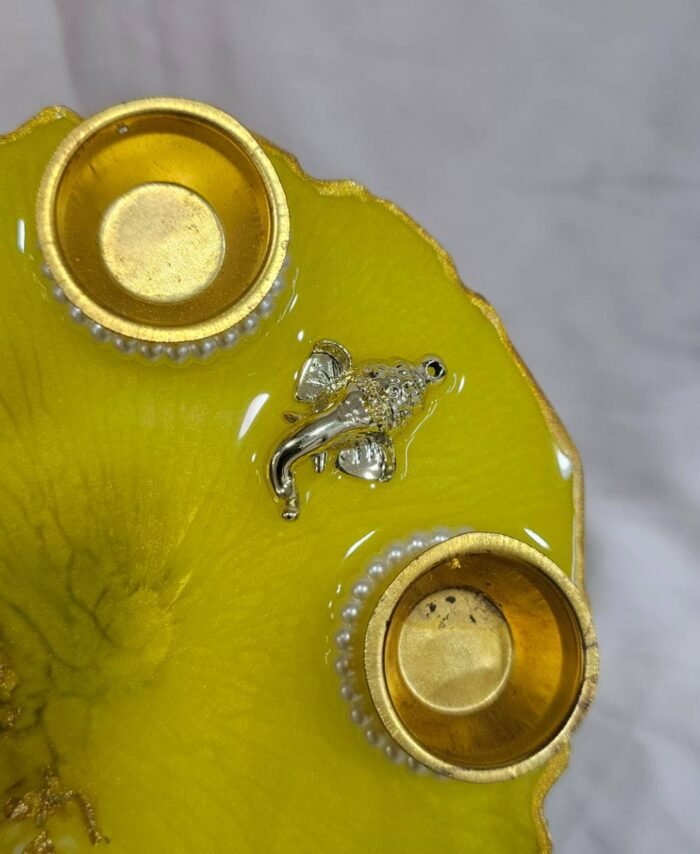 Yellow resin Ganesha thali for festivals