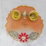 Peach resin pooja thali with Ganesha idol