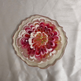 Handmade resin coaster with pink flower petal design
