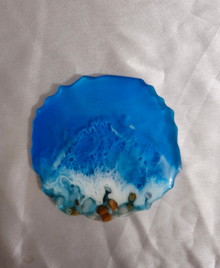 Handmade resin coaster with ocean blue wave design