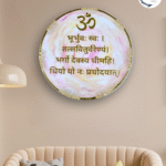 Round resin wall frame with Gayatri Mantra in gold Sanskrit and Om symbol