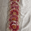 Resin coaster with gold glitter center bloom pattern