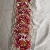 Resin coaster with gold glitter center bloom pattern