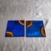 Handmade square blue resin and wood coaster with ocean-inspired design by Resineera